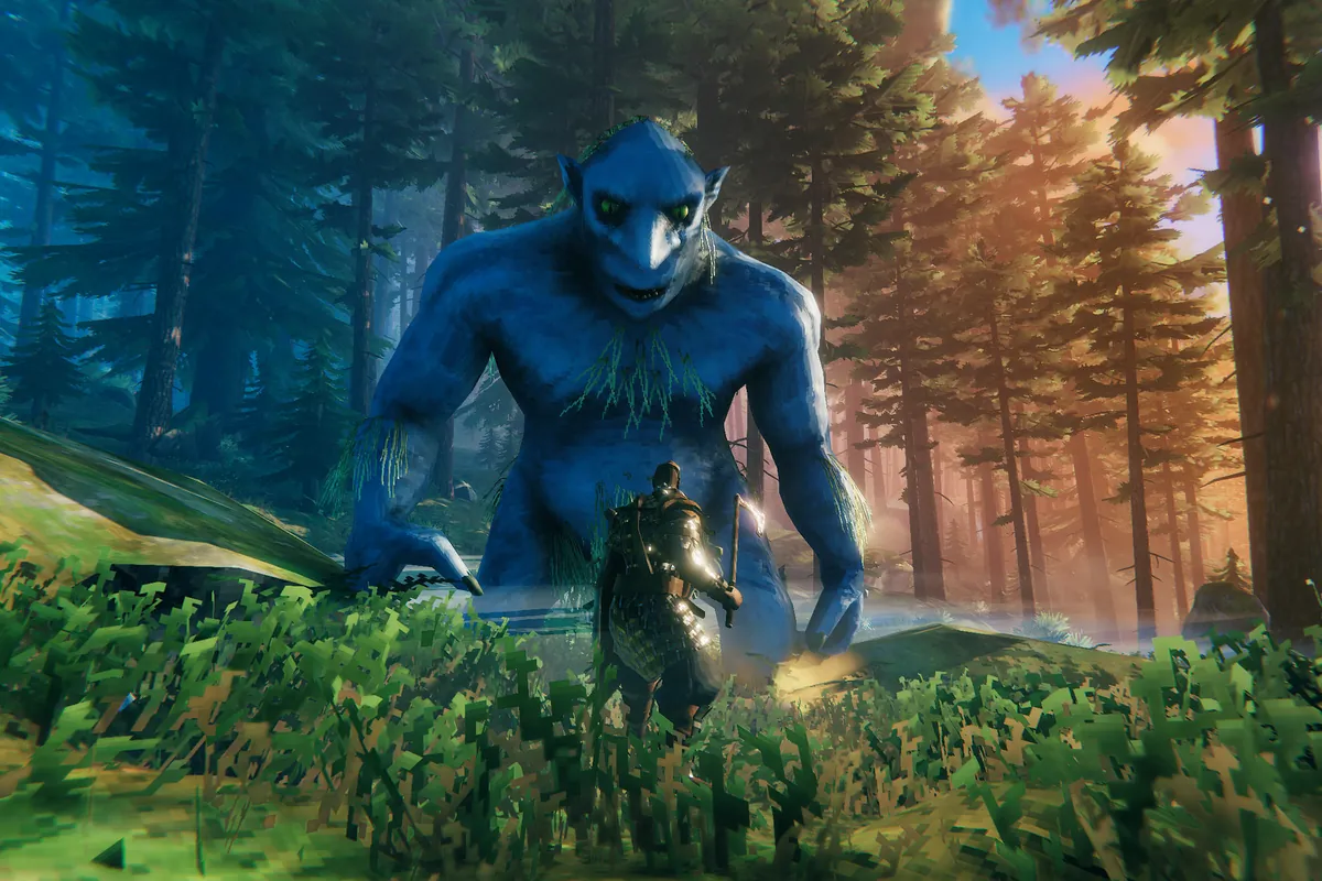 A troll stalking through a forest clearing in Valheim